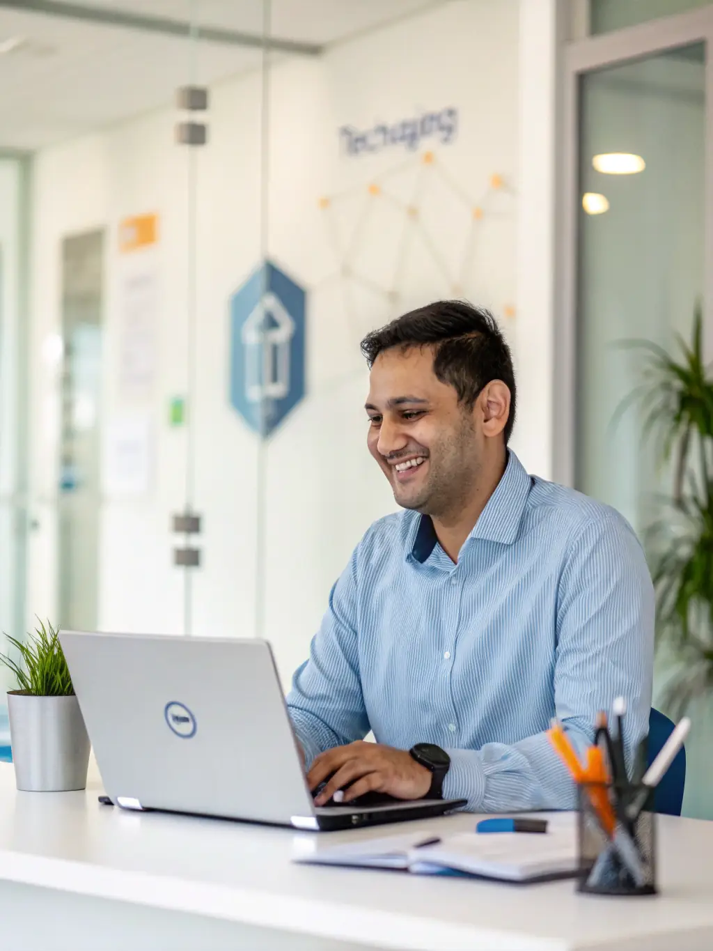A support team assisting a small business owner with their system migration, showcasing personalized support and guidance during the integration process.